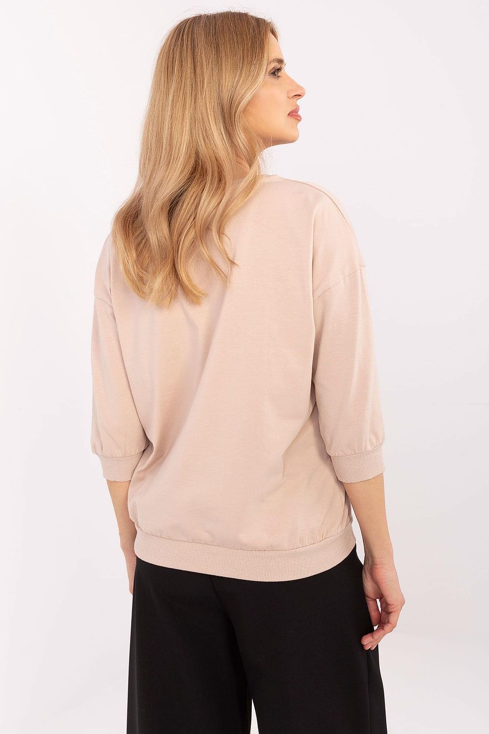 The graceful silhouette of the Relevance 3/4 sleeve casual blouse, made from high-quality cotton and spandex for a perfect fit.