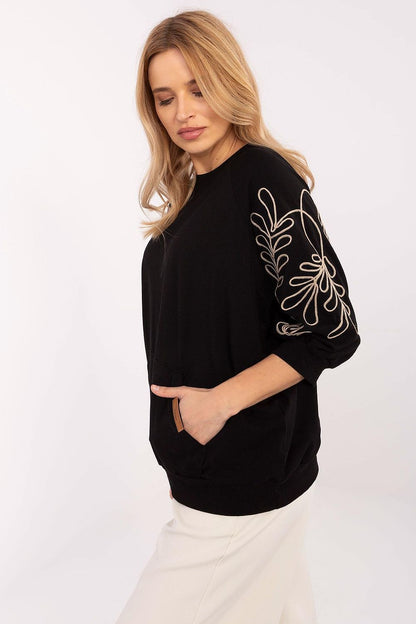 Elegant Women's 3/4 Sleeve Sweatshirt by Relevance featuring a kangaroo pocket and embroidered leaf patterns, perfect for stylish everyday wear.
