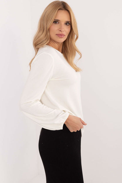 Relevance stylish blouse made from 95% modal and 5% spandex, showcasing a round neckline and long sleeves for a sophisticated look.