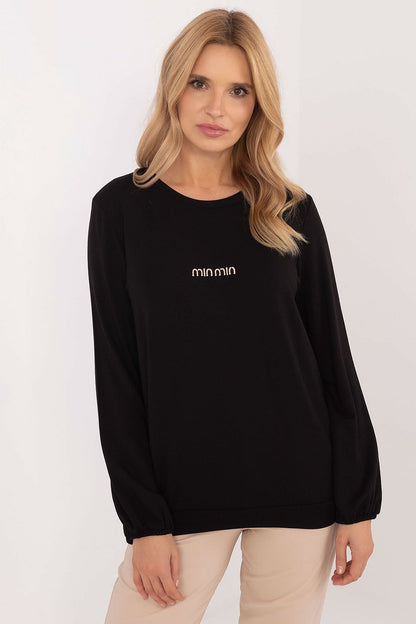 Elegant long sleeve micro modal blouse by Relevance, showcasing a sophisticated round neckline and subtle front inscription, perfect for versatile wardrobe styling.