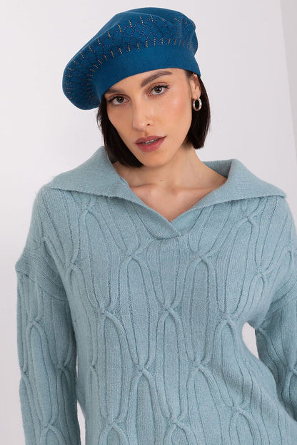 Side view of the elegant beret hat by AT, highlighting its smooth texture and refined aesthetic.