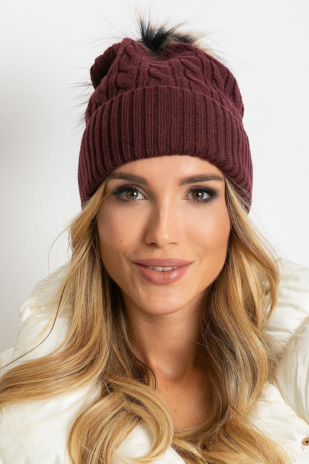 Sophisticated winter hat with a wide cuff and plush pompom by AT, made with a luxurious combination of 50% acrylic, 30% cotton, and 20% cashmere.