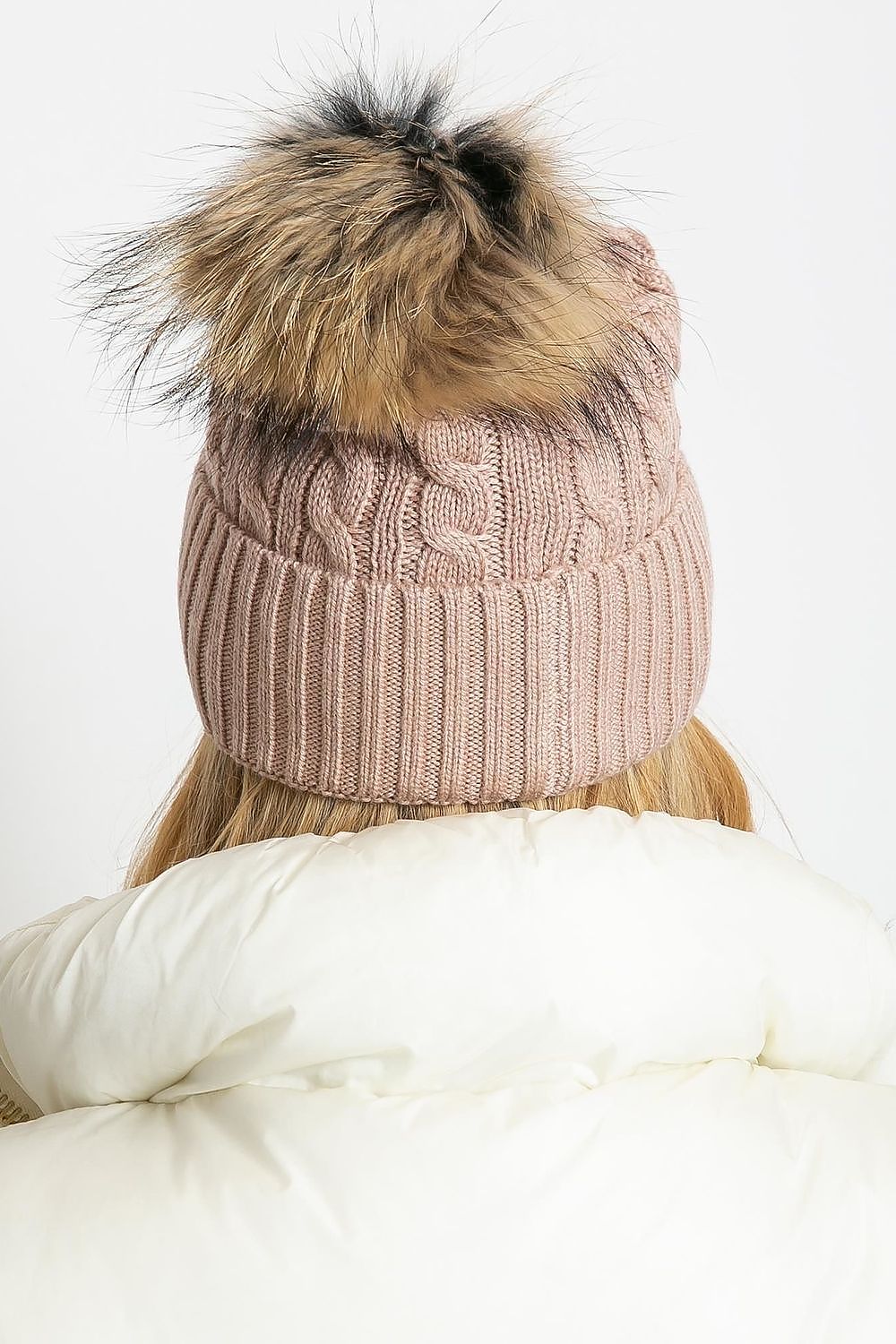 Elegant winter hat designed by AT with a stylish wide cuff and soft fluffy pompom, ideal for cold weather, made with a luxurious mixture of acrylic, cotton, and cashmere.