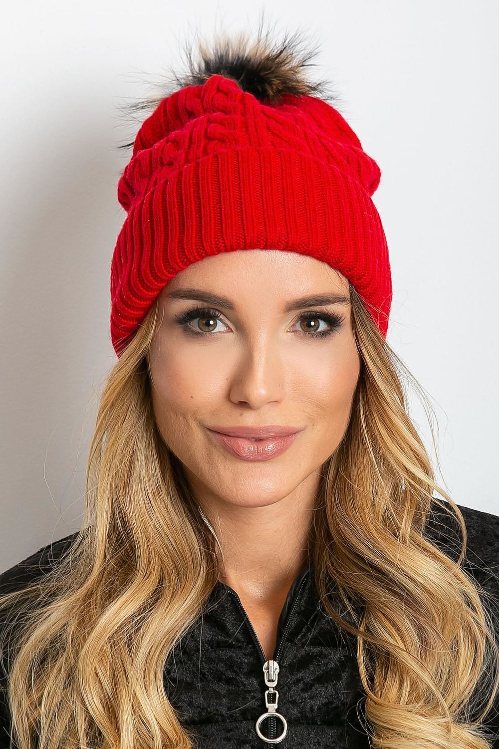 Chic winter cap by AT showcasing a wide cuff and a fluffy pompom, designed in a luxurious blend of acrylic, cotton, and cashmere.