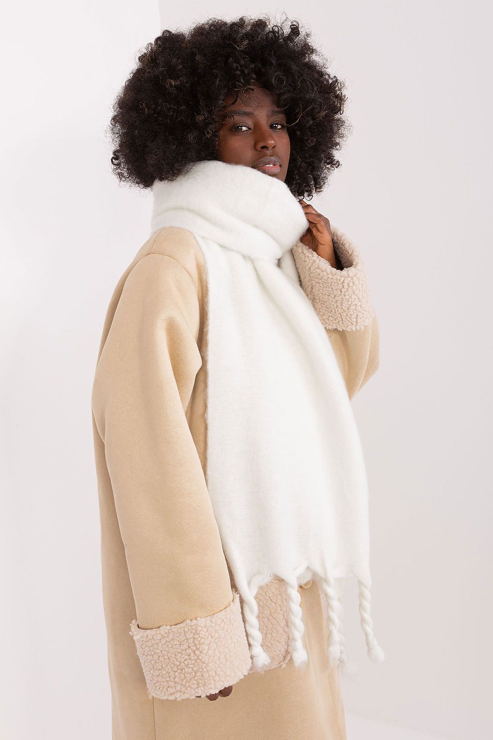 Elegant long polyester shawl scarf with fringes by AT, showcasing versatility and warmth for cooler seasons.