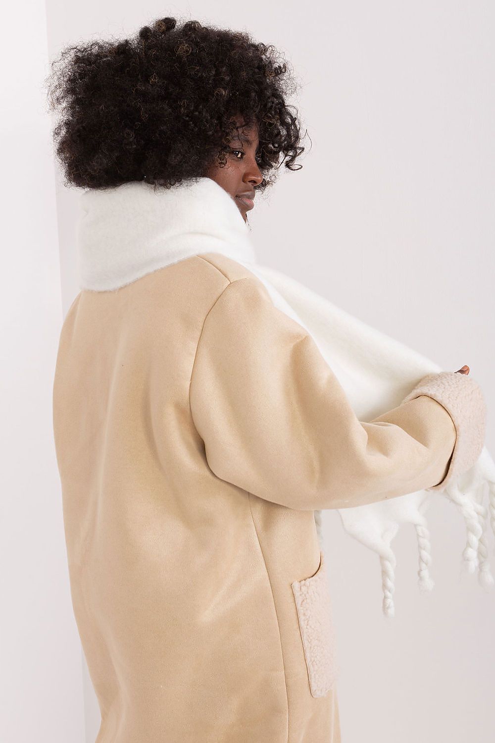 Chic and soft textured 210cm polyester scarf with fringes by AT, ideal for adding a touch of sophistication to any outfit.