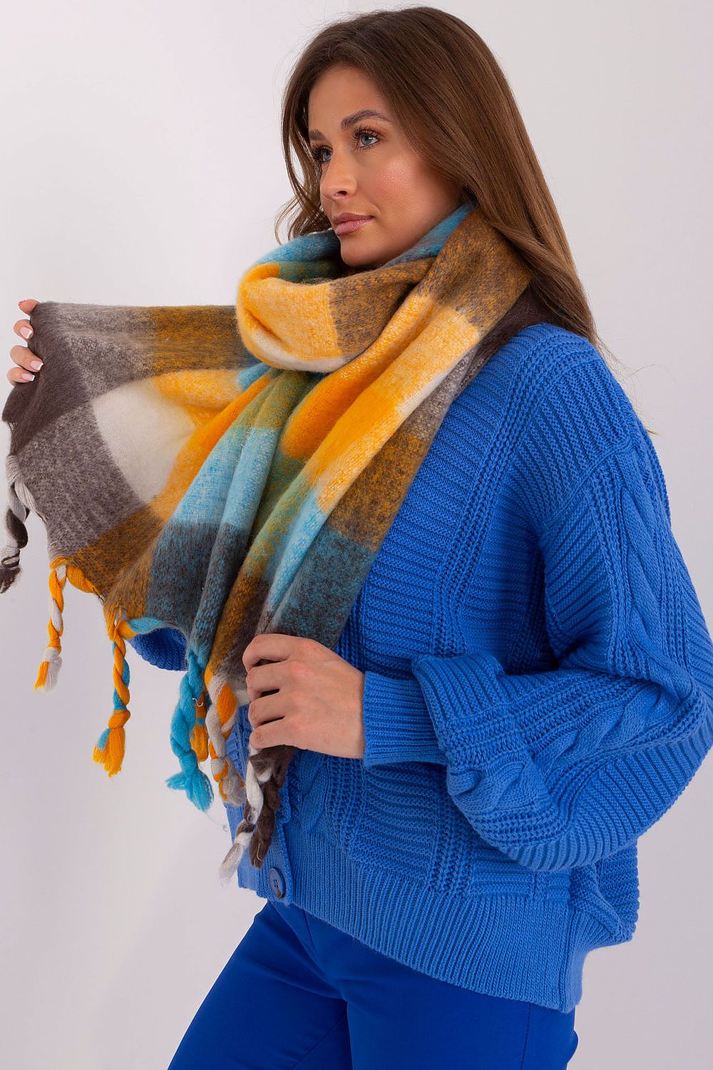 Elegant 100% polyester warm wrap scarf from AT, perfect for versatile styling during the colder months.