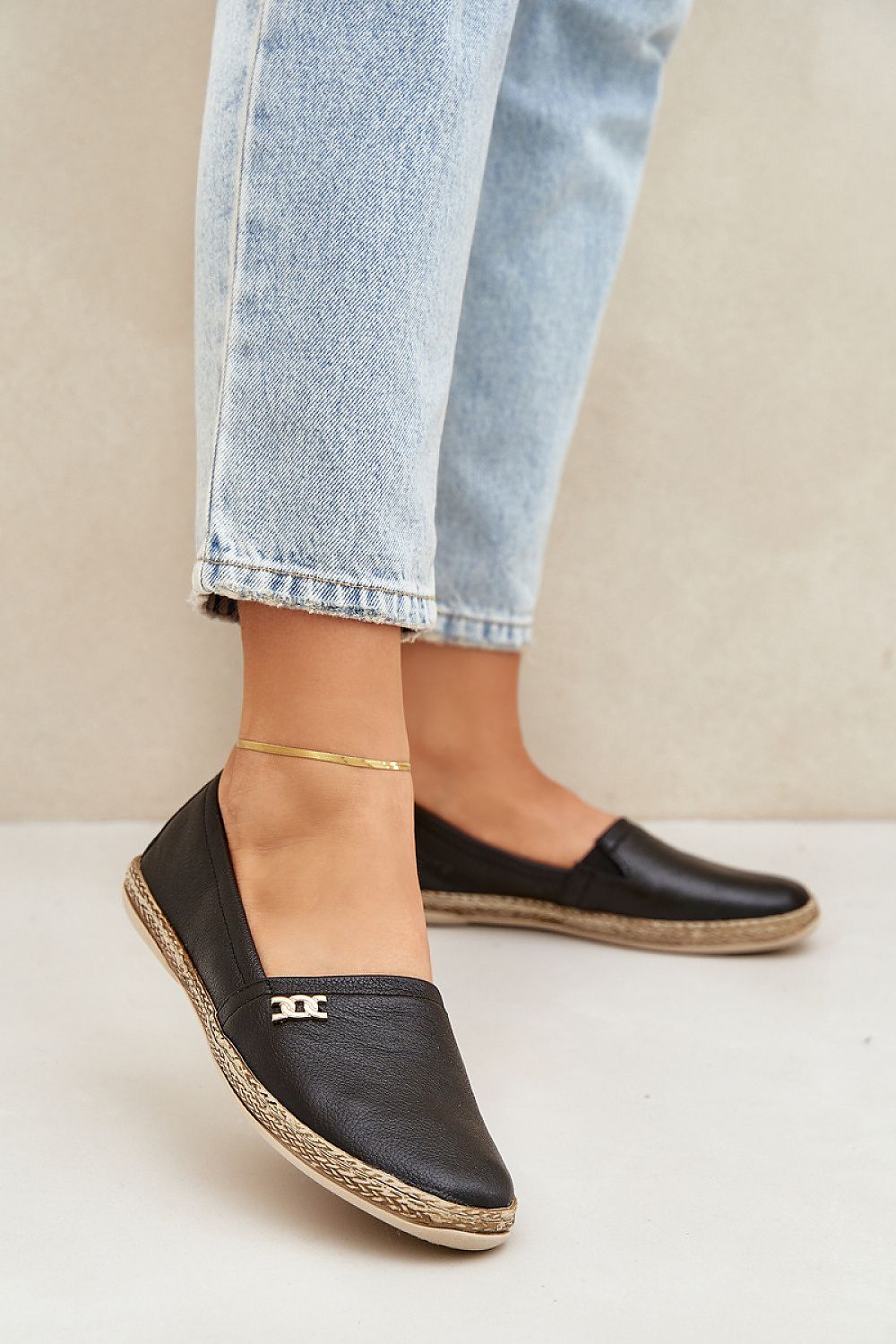 Stylish flat-soled women's espadrilles in natural suede from Step in Style, designed for comfort and sophistication during warm days.