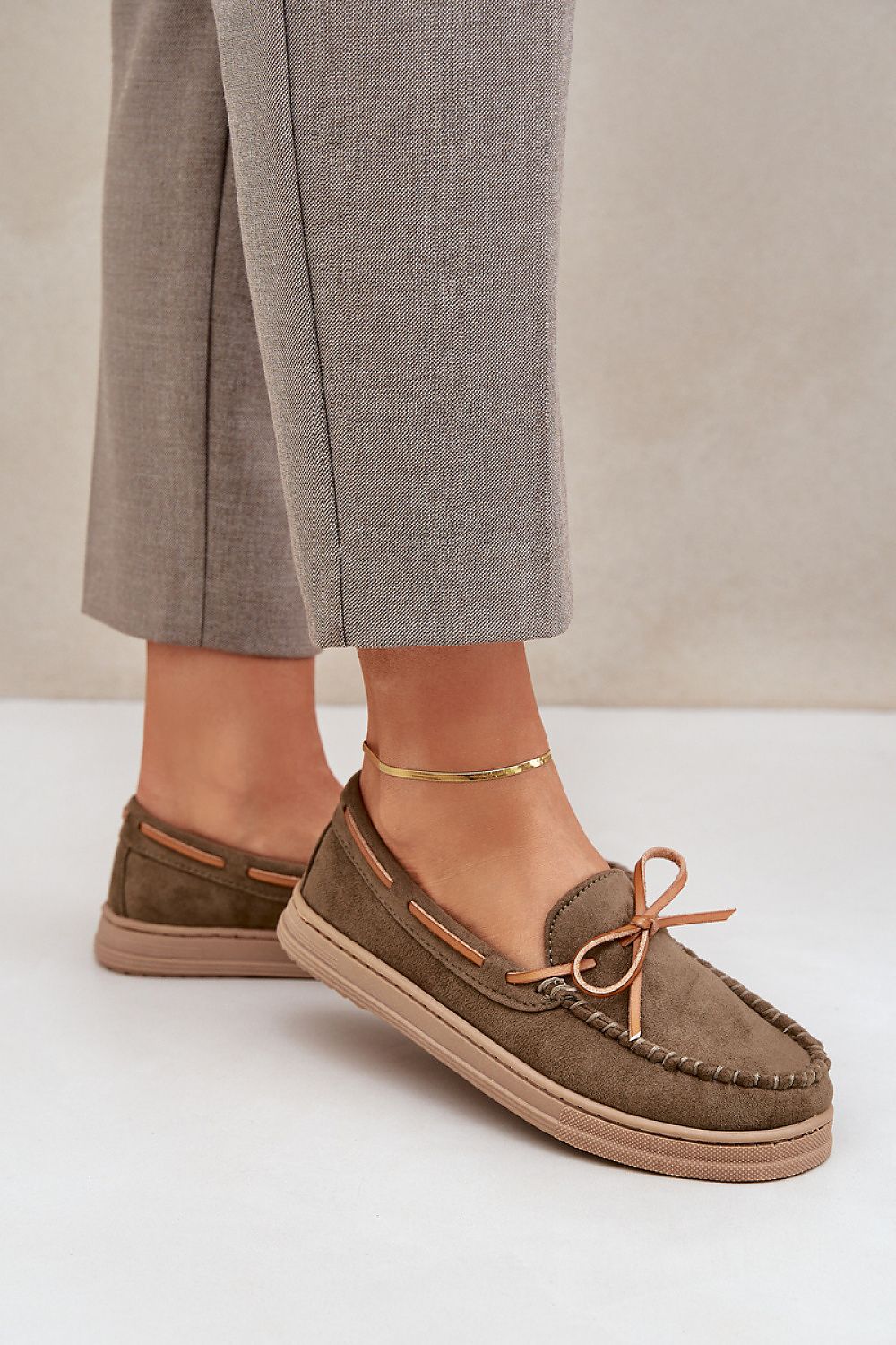 Elegant women's eco-suede moccasins with bow detail by Step in Style, designed for comfort and luxury in sizes EU 36-41.