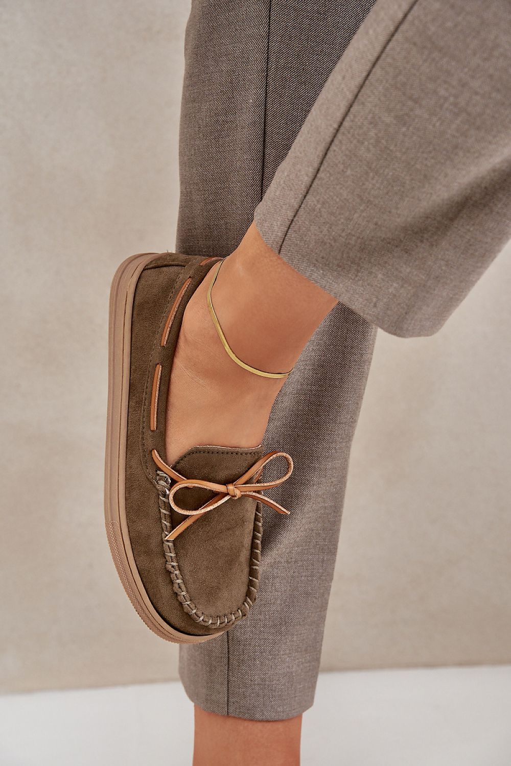 Elegant eco-suede moccasins for women by Step in Style, featuring a delicate bow detail and available in sizes EU 36-41, perfect for chic comfort.