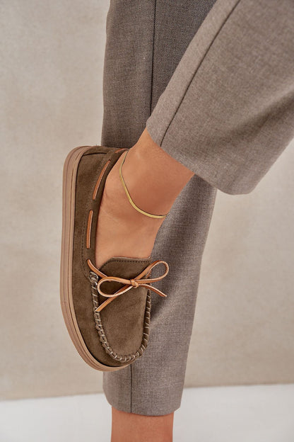Elegant eco-suede moccasins for women by Step in Style, featuring a delicate bow detail and available in sizes EU 36-41, perfect for chic comfort.