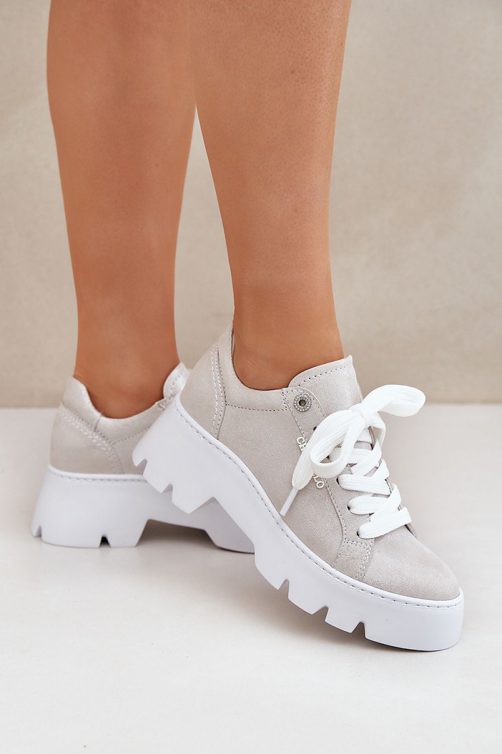 Unveiling the chic side of comfort: Step in style women's natural leather sneakers with a seamless blend of elegance and durability.