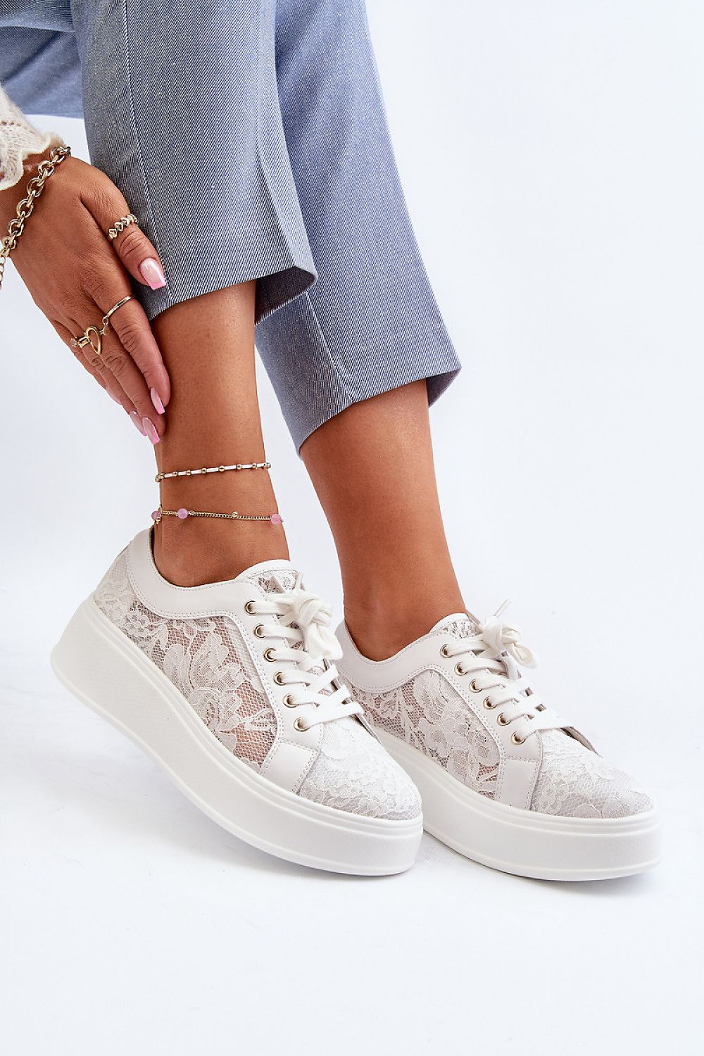Close-up of S.Barski women's platform sneakers, highlighting the delicate lace upper and soft insole for luxurious comfort.