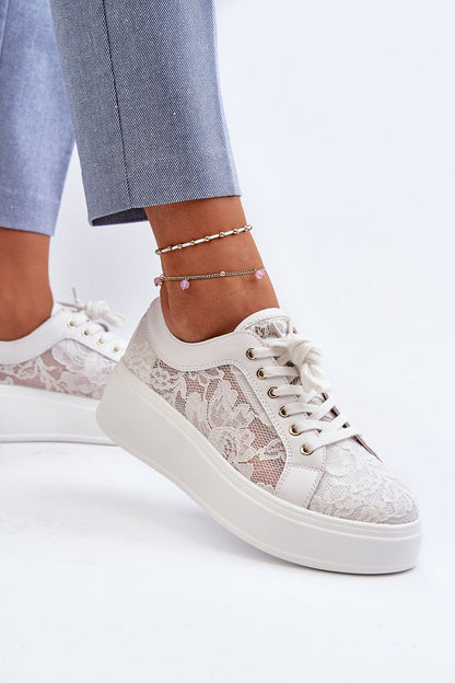 Fashionable women's platform sneakers by S.Barski displayed in a chic setting, combining fashion-forward elements with ultimate comfort.