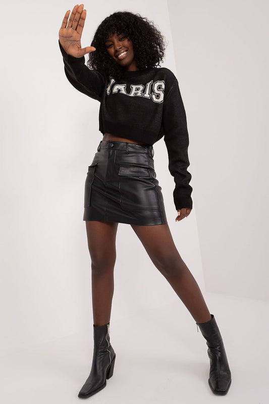 Soft acrylic and wool blend Badu short women's jumper, featuring stylish long sleeves and modern front writing, ideal for pairing with jeans or skirts.
