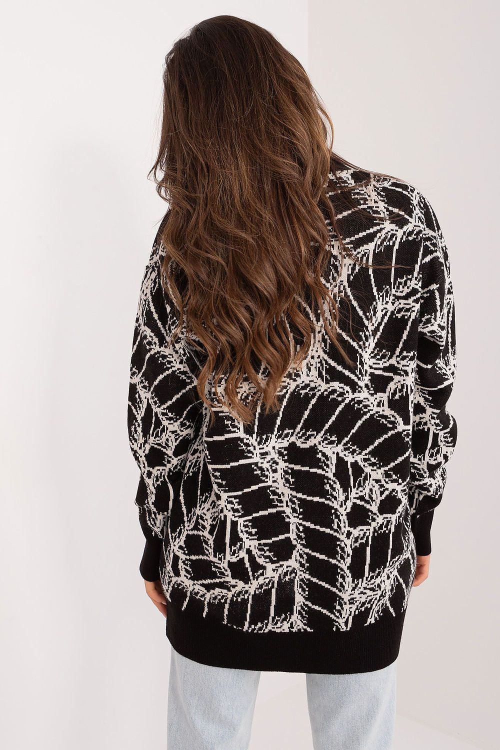 Chic and comfortable women's V-neck cardigan sweater from Badu, ideal for pairing with jeans or skirts, showcasing a unique print and luxurious fabric.