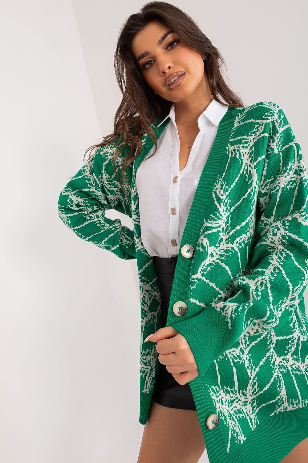 Luxury women's V-neck cardigan sweater by Badu, made from a stylish acrylic-wool blend, showcasing elegant button closure and sophisticated print.