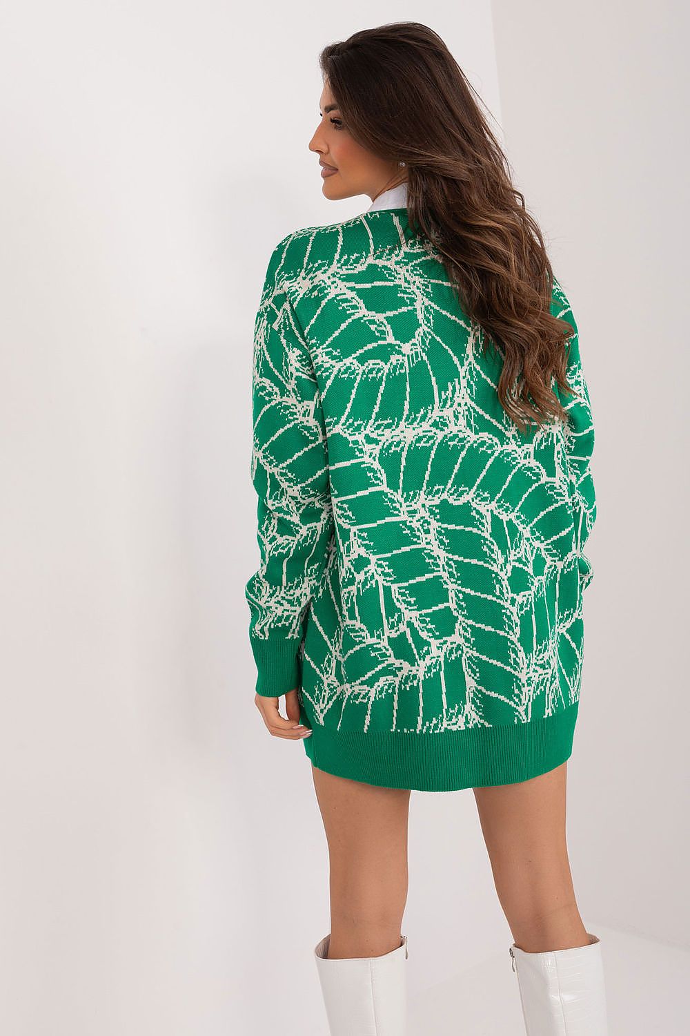 Fashionable ensemble featuring Badu’s elegant women's V-neck cardigan sweater styled with jeans, illustrating versatile fashion for everyday wear.