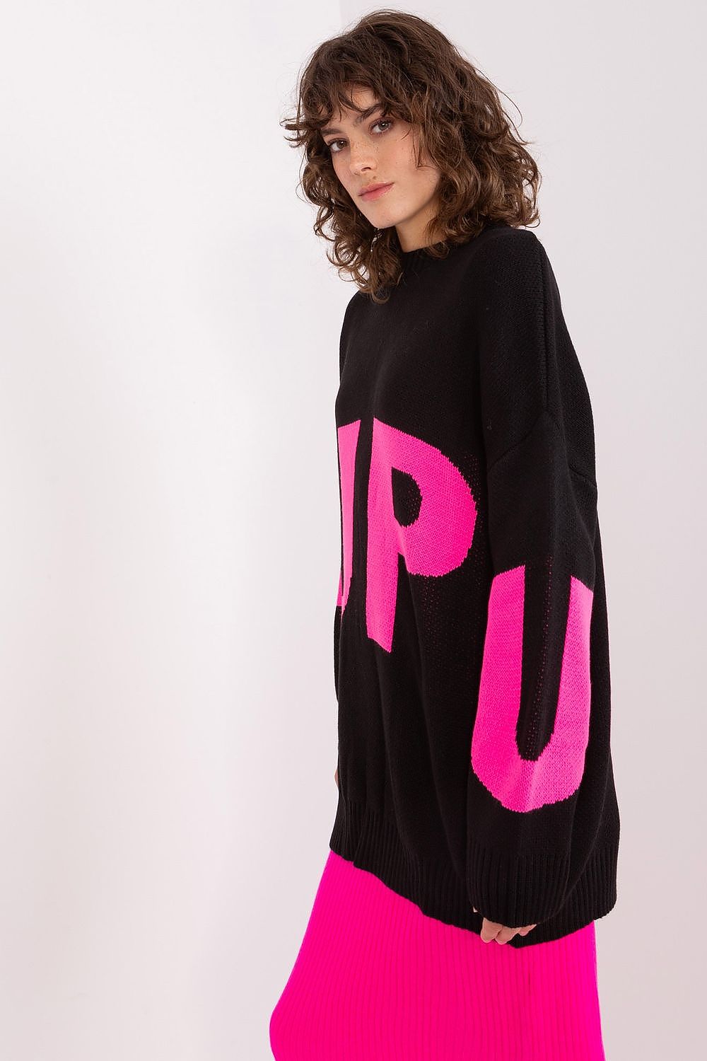 Elegant long women's sweater from Badu, showcasing a stylish print perfect for pairing with jeans or leggings.