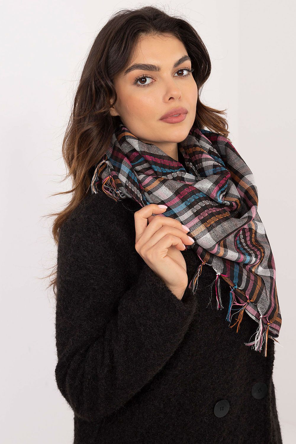 AT's luxurious checkered scarf displayed as a versatile accessory, showcasing its large size and classic design for any occasion.