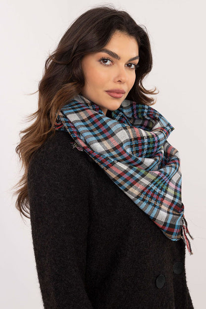 Fashionable checkered scarf by AT, made from a soft polyester and viscose blend, exemplifying luxury and comfort.