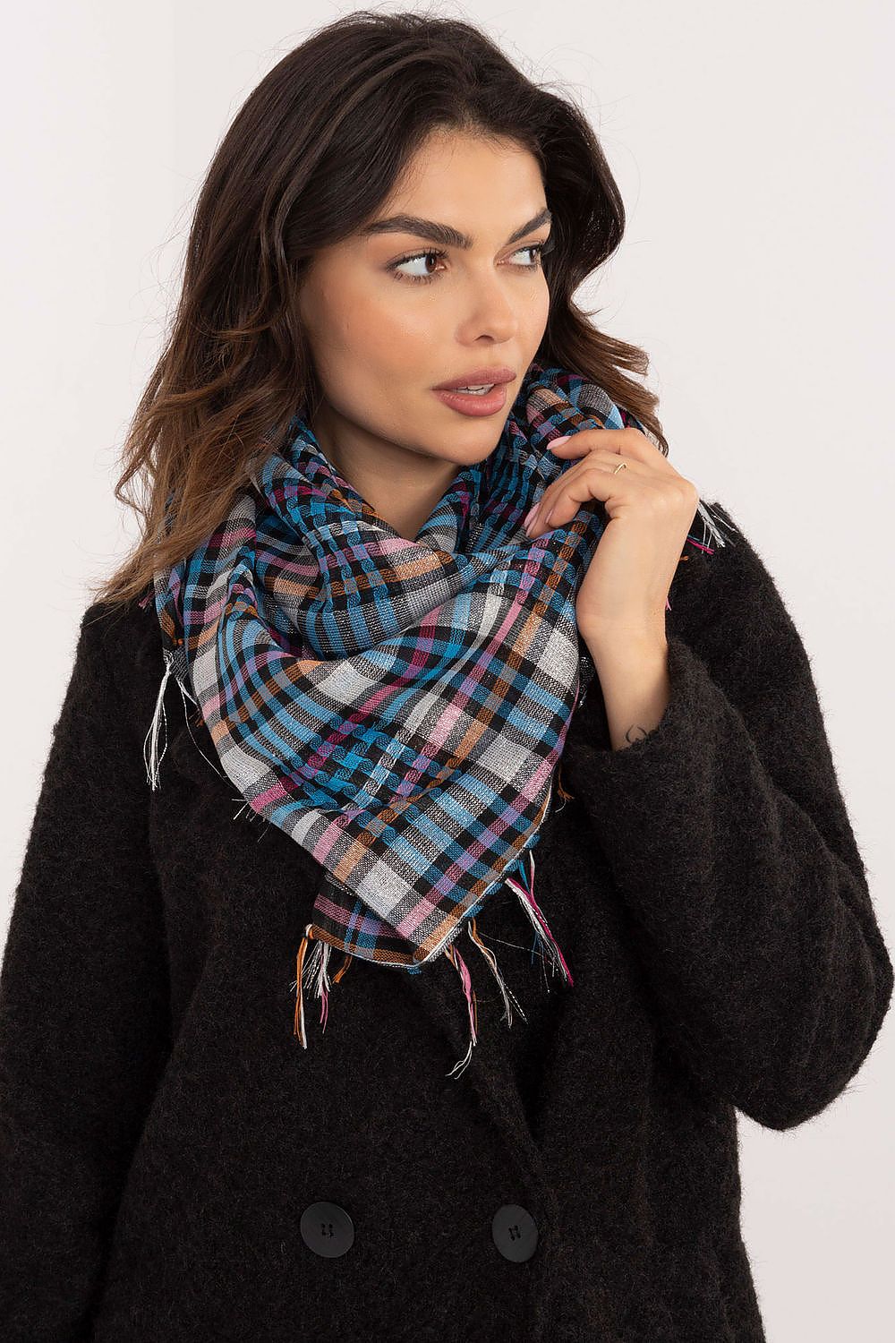 AT stylish scarf with fringed edges, a blend of polyester and viscose, designed to elevate your casual and work attire.