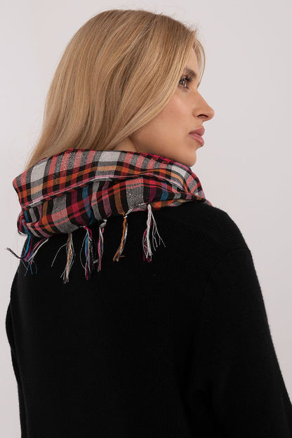 Chic checkered arafatka scarf from AT, highlighting its fashionable fringes and suitable for both everyday wear and travel.