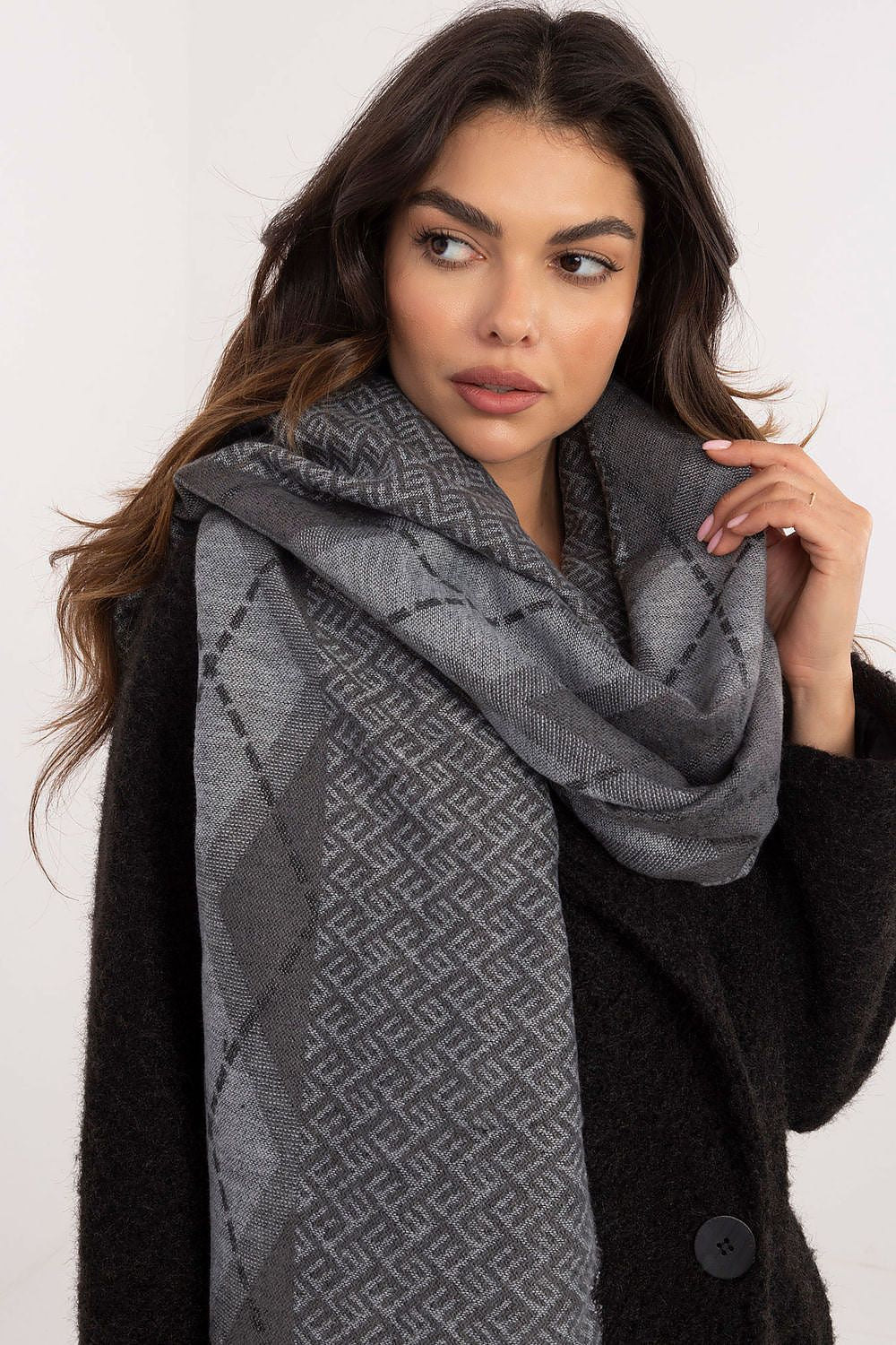 AT elegant viscose scarf with a chic geometric design, perfect for enhancing any wardrobe with a touch of luxury.
