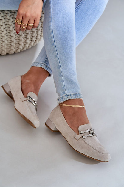 Step in Style women's moccasins, crafted from eco suede with a natural leather footbed for exquisite comfort and style.
