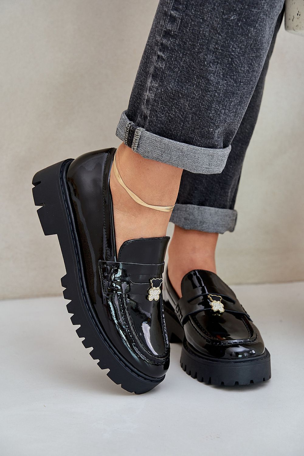 Luxury eco-leather women's loafers with enchanting teddy bear pin by Step in Style, showcasing elegance and comfort in a chic design.