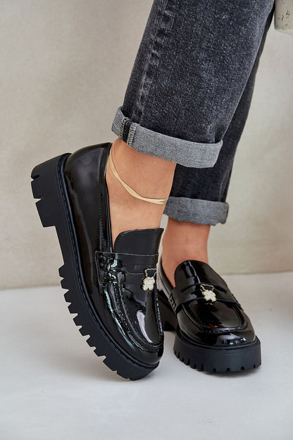 Luxury eco-leather women's loafers with enchanting teddy bear pin by Step in Style, showcasing elegance and comfort in a chic design.