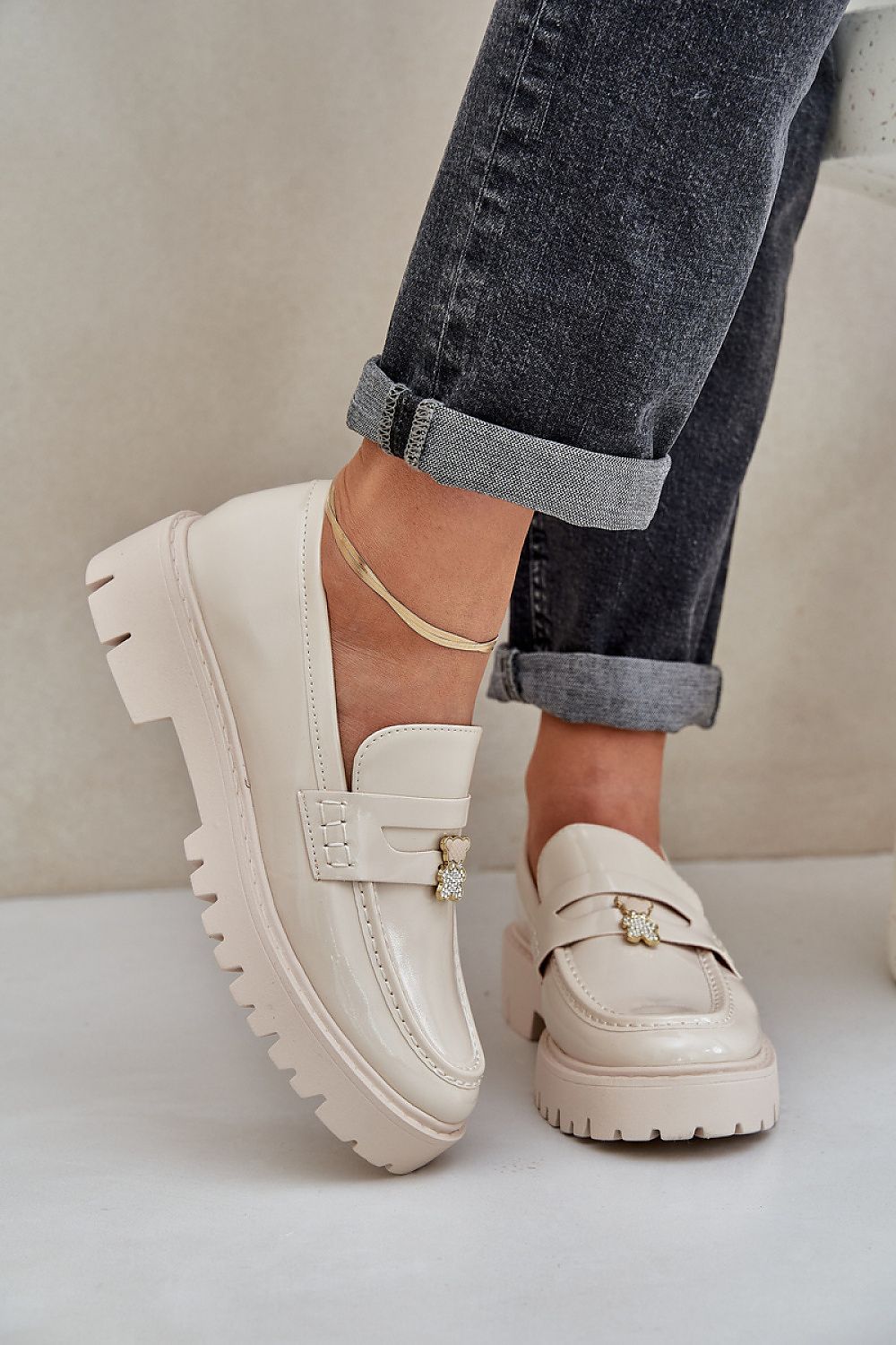 Chic women's loafers in eco-leather with a playful teddy bear pin, offering luxury and comfort by Step in Style.