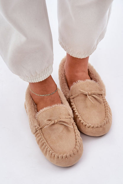 Step in Style luxury moccasin slippers with a chic design, made from eco suede and fur lining for added warmth.