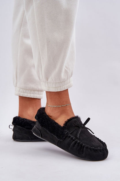 Step in style luxuriously soft eco suede moccasin slippers showcasing a classic design with fur lining for ultimate comfort.