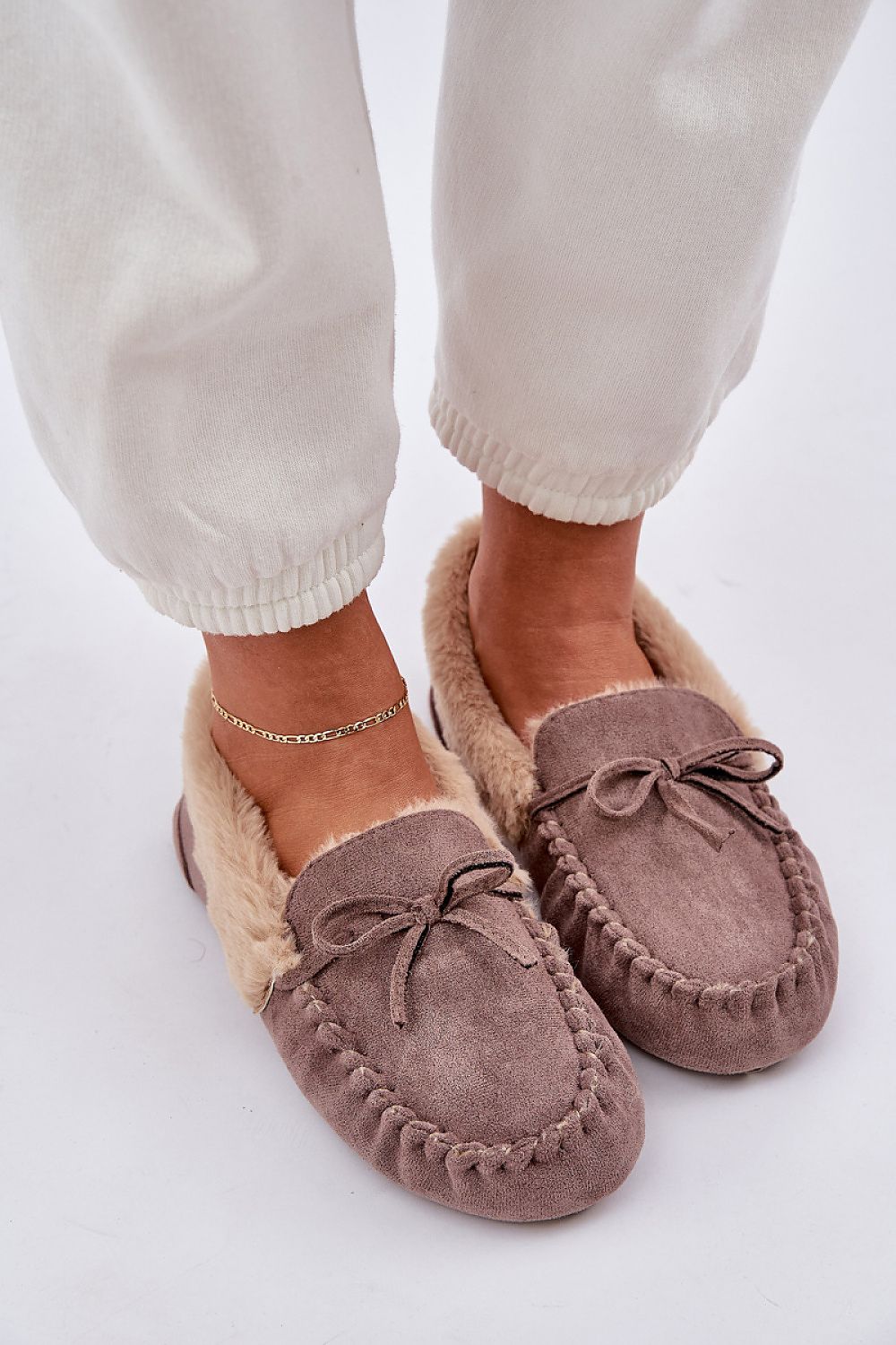Stylish luxury eco suede moccasin slippers by Step in style, perfect for indoor wear, combining fashion with comfort.