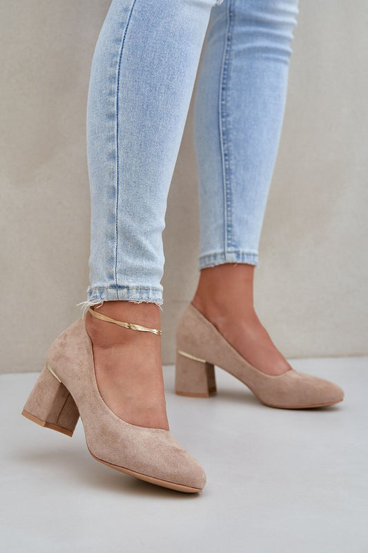 Elegant suede block heel pumps by Step in Style, featuring a stylish design with a comfortable rounded toe and luxurious finish, ideal for both formal and casual occasions.