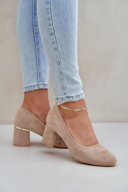 Stylishly arranged display of women's block heel pumps in various sizes EU 36-41 by Step in Style, made from premium imitation leather suede for an upscale, chic look.
