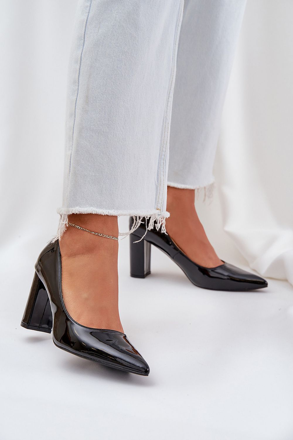 Stylish women's eco leather pumps featuring a robust block heel, crafted by Step in Style for elegant and comfortable wear.