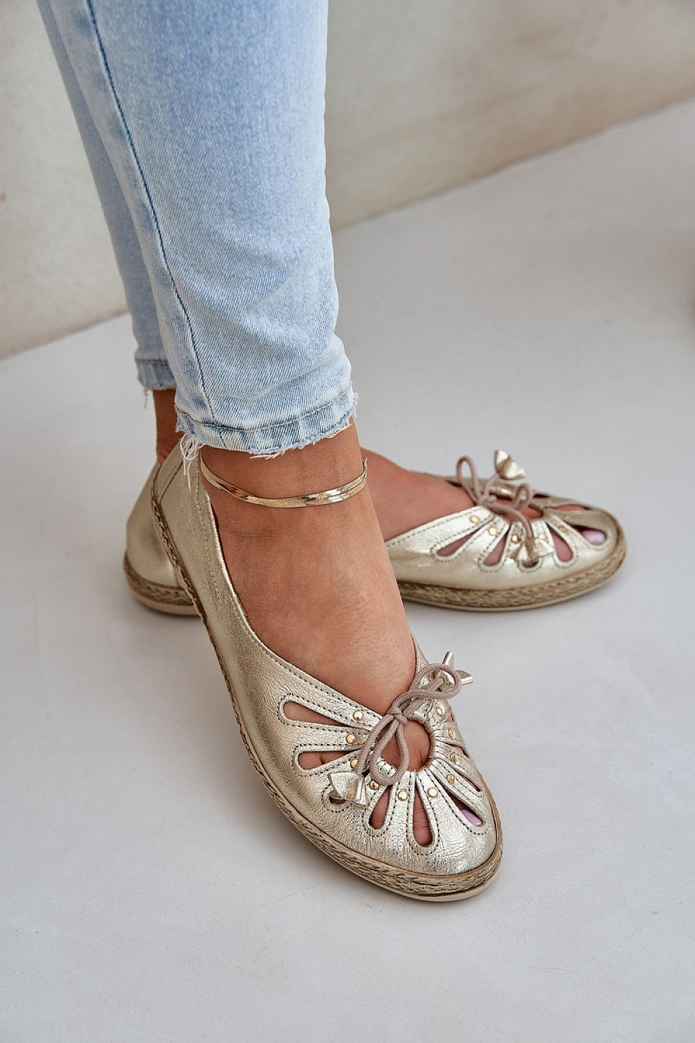 Elegant natural leather ballet flats by Step in style, featuring subtle lacing and delicate cutouts, ideal for sophisticated everyday wear.