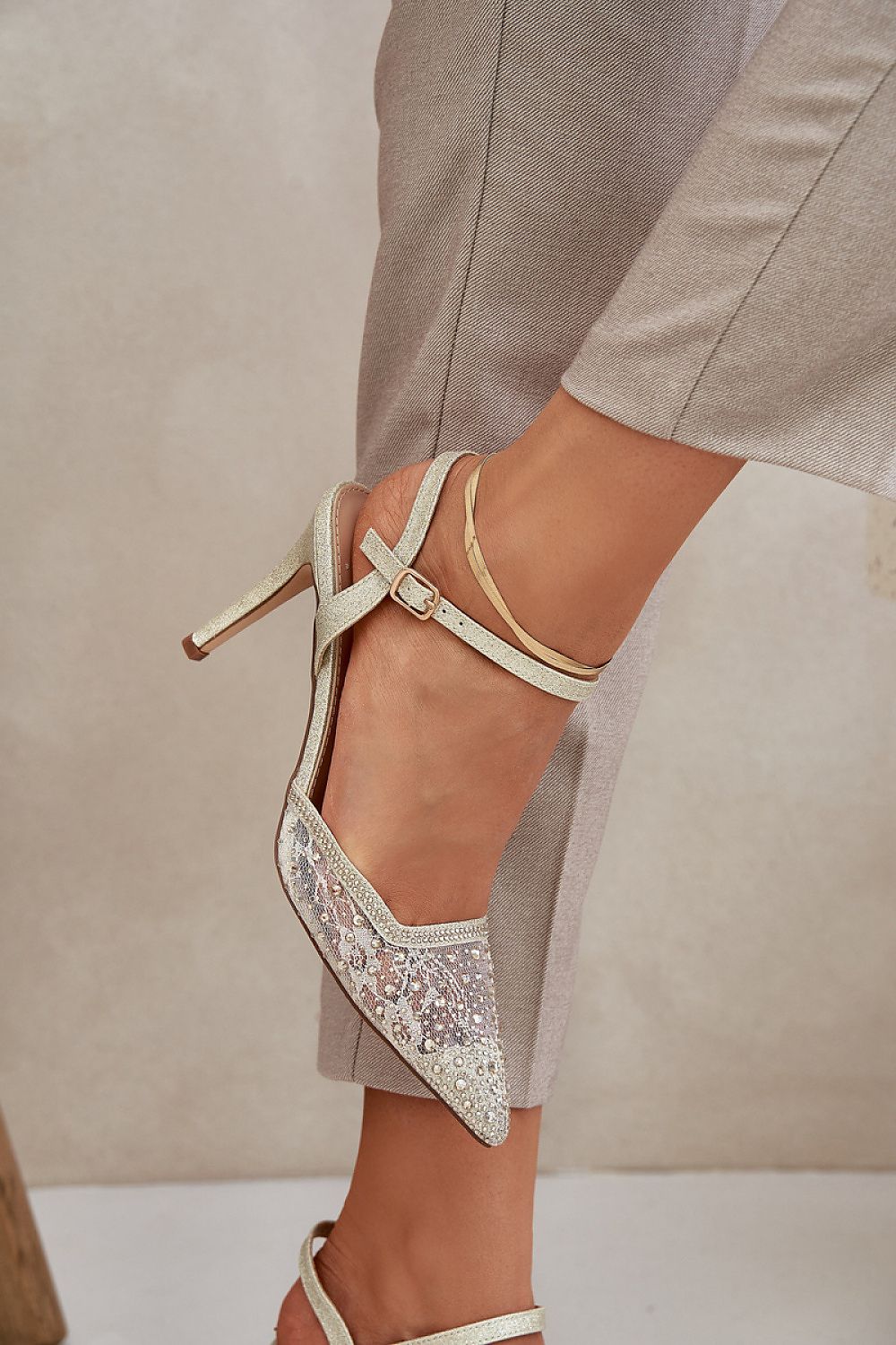 Chic adjustable strap high heels by Step in Style, offering a blend of elegance and modern style, suitable for any special occasion.