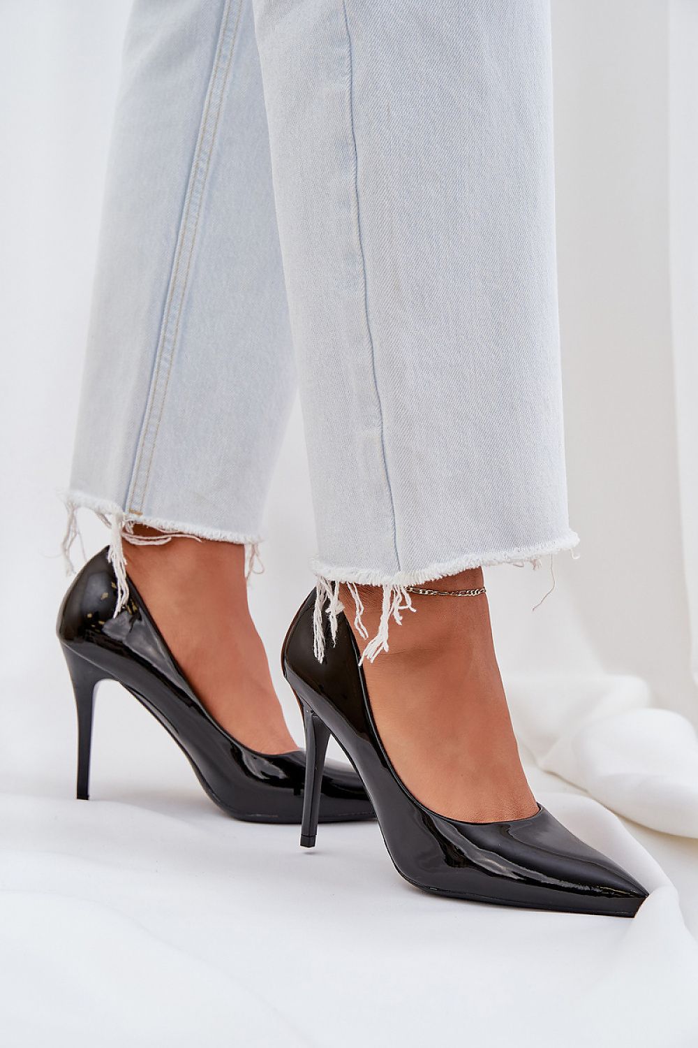 Elegant women's patent leather high heels by 'Step in Style', featuring a 10.5 cm heel height, perfect for adding sophistication to any outfit.