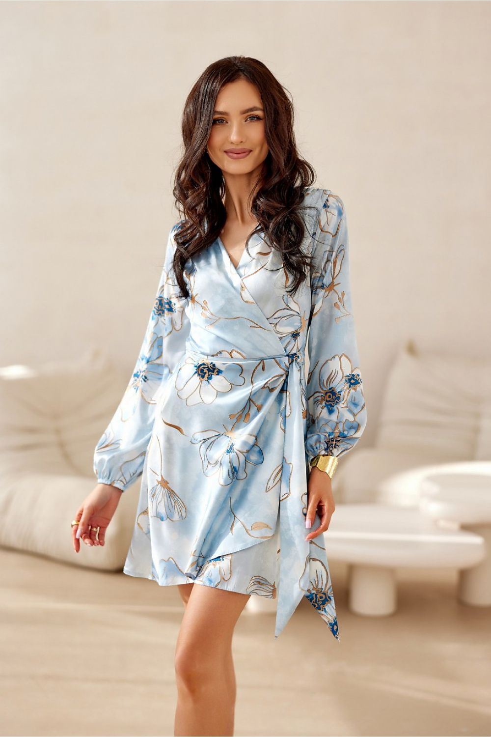 Luxurious mini dress by Roco Fashion with long sleeves and a stylish wrap top, showcasing the flared bottom design.