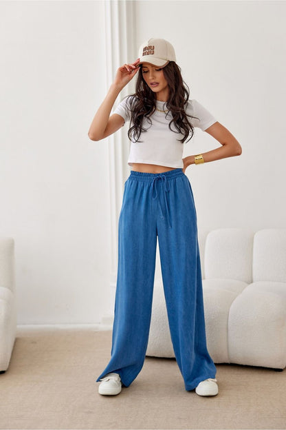 Elegant Roco Fashion high waist women's trousers featuring wide legs, made from 100% Tencel, perfect for sophisticated styling.