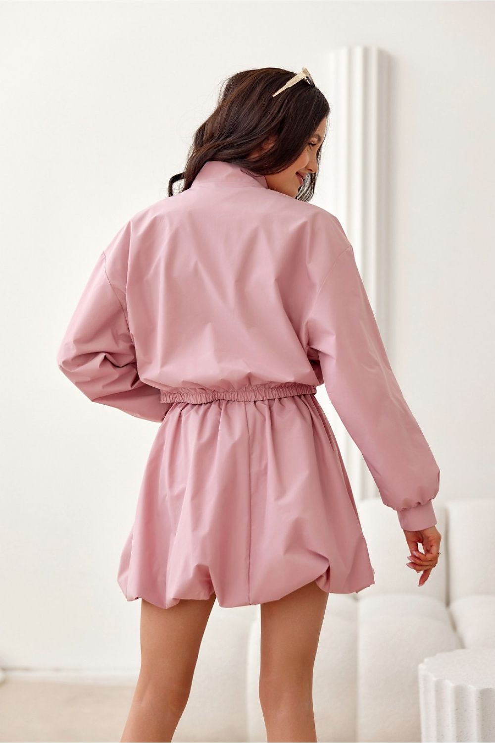 Roco Fashion bomber jacket showcasing dual side pockets with flaps, epitomising practicality and style in luxurious outerwear.