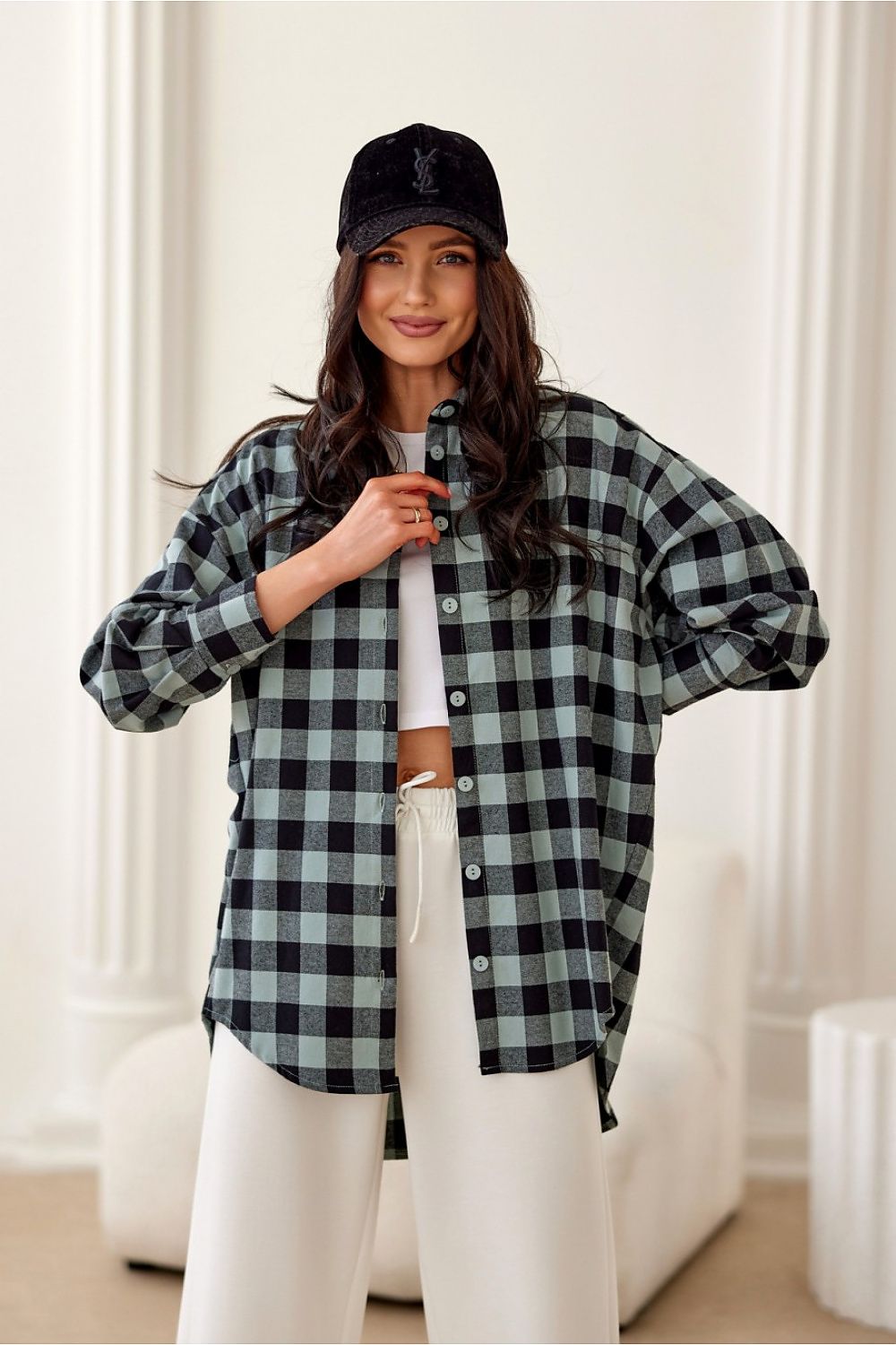 Roco Fashion Women's Long Sleeve Flannel Shirt showcasing elegant casual style, perfect for versatile occasions, featuring a classic collar, dropped shoulder design, and high-quality flannel material.