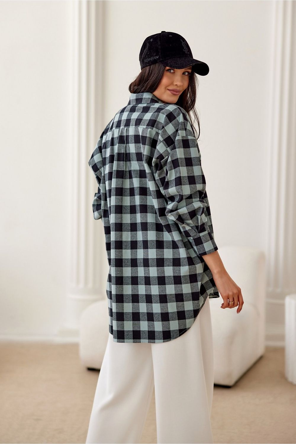 Close-up of Roco Fashion Women's Flannel Shirt detailing classic collar and buttoned cuffs for sophisticated appeal.