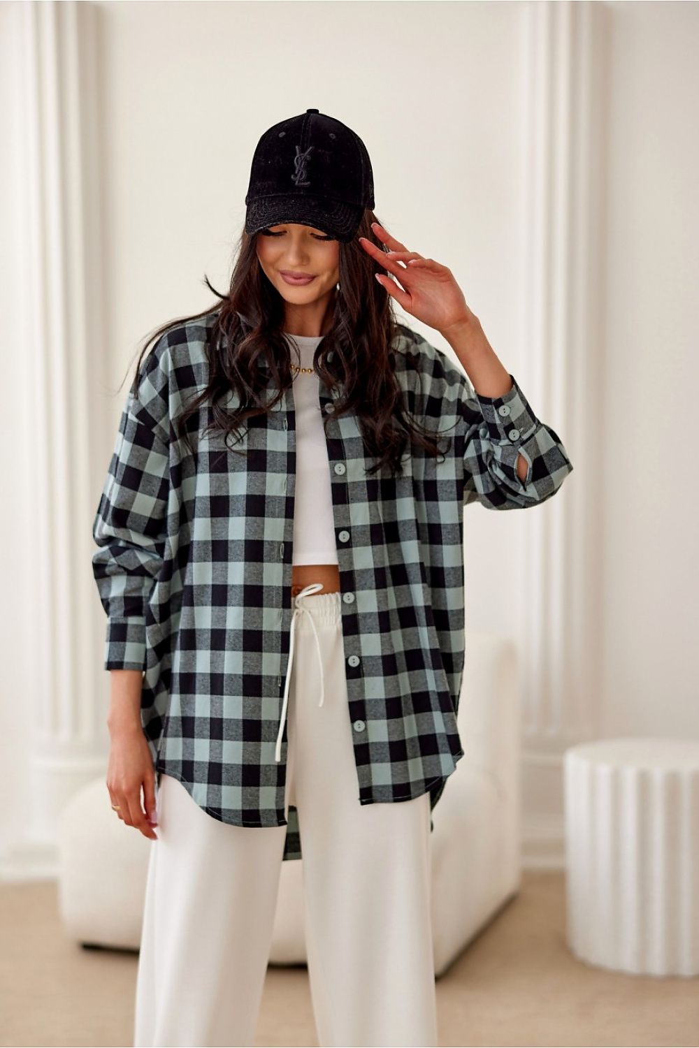 Roco Fashion flannel shirt designed in Poland, featuring a unique elongated back for an elegant silhouette.