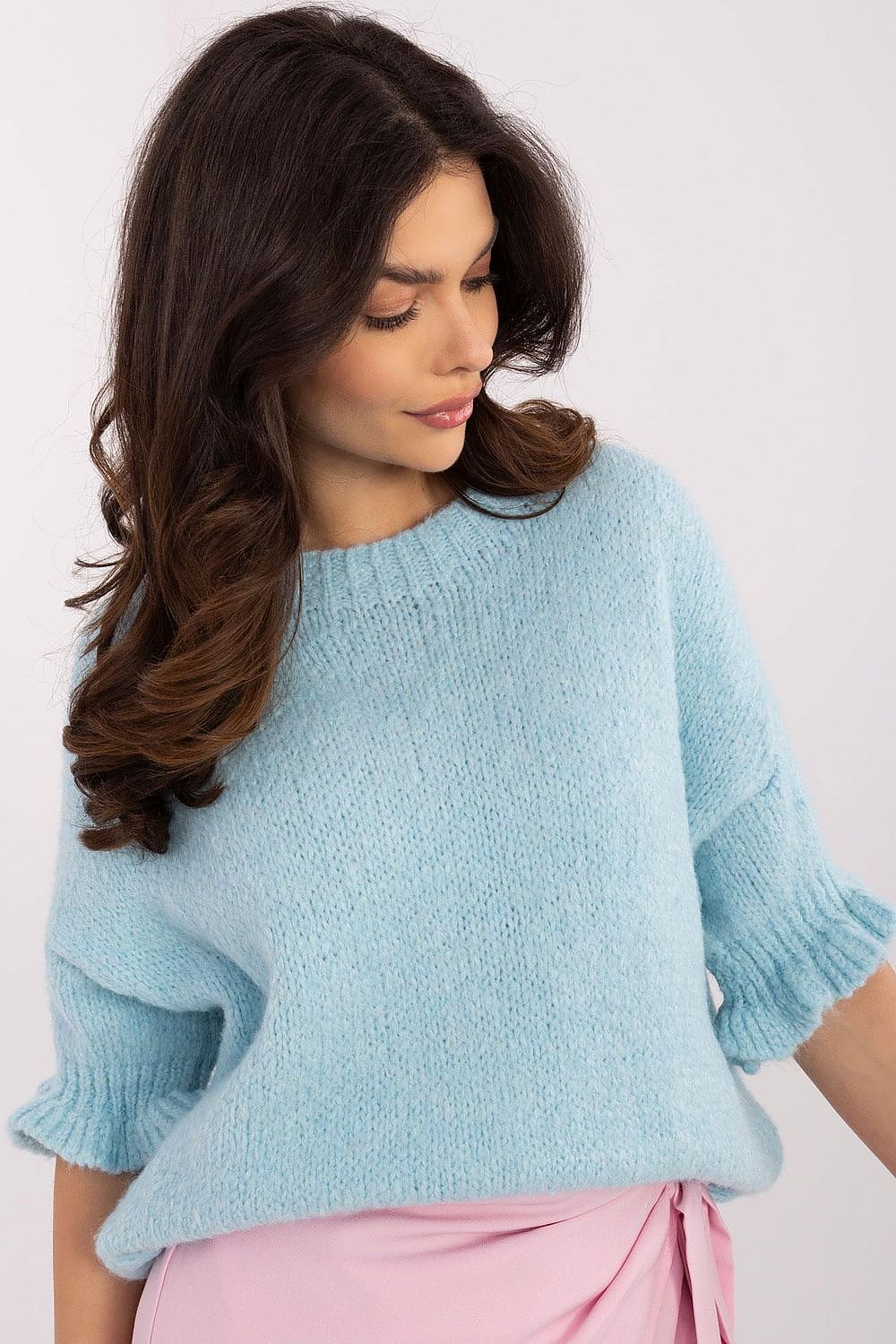 Chic women's sweater by Italy Moda featuring 3/4 length sleeves with ruffles and a smooth texture, designed for versatility in both casual and upscale styles.