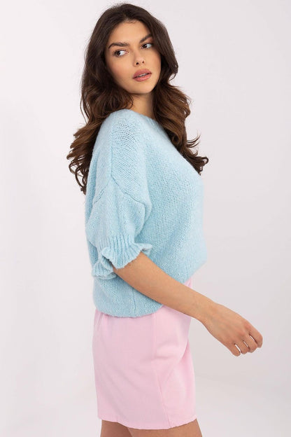 Ireland Moda elegant women's sweater with ruffle sleeves, crafted from a soft acrylic-wool blend, perfect for everyday sophistication.