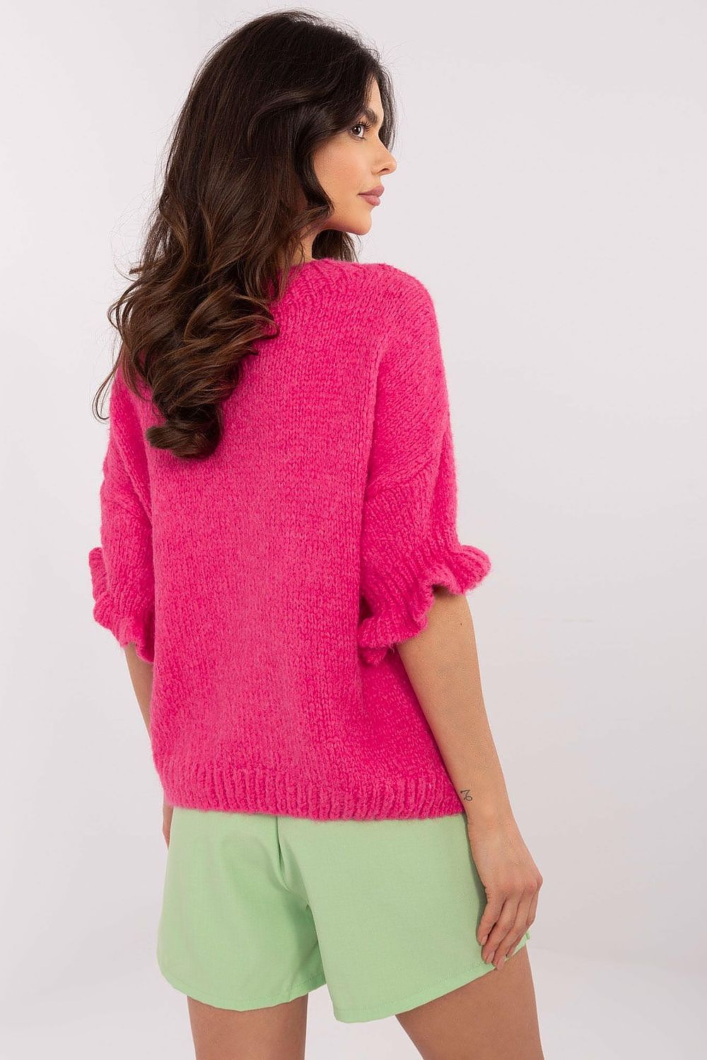 Chic and stylish Italy Moda women's sweater, designed with 3/4 length ruffle sleeves for a fashionable look.